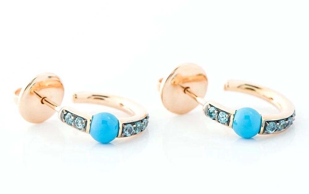 POMELLATO MAMA NON MAMA TURQUOISE BLUE ZIRCON HOOP EARRINGS: Pomellato Mama Non Mama Turquoise Blue Zircon Hoop Earrings Brand: Pomellato Type: Earrings Material: 18k Rose Gold Main Stone/Creation Natural Color: Pink Size: Approx. H14.4 × W4.4 mm