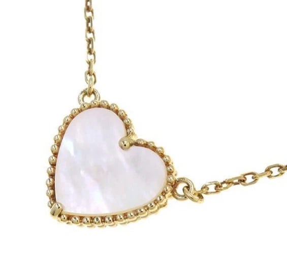 VAN CLEEF & ARPELS LUCKY ALHAMBRA MOP HEART NECKLACE PENDANT: Van Cleef & Arpels Lucky Alhambra MOP Heart Necklace Pendant Brand: Van Cleef & Arpels Type: Necklace Material: 18k Yellow Gold Main Stone/Creation Natural Color: Yellow Size: Chain Length: