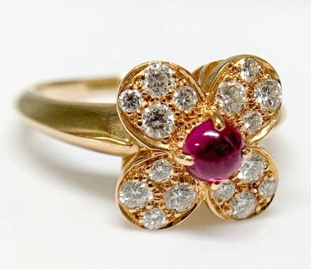 VAN CLEEF & ARPELS TREFLE RUBY DIAMOND RING: Van Cleef & Arpels Trefle Ruby Diamond Ring Brand: Van Cleef & Arpels Type: Ring Material: 18k Gold Main Stone/Creation Natural Color: Yellow Size: 6 US Accessories: None Accessories Notic