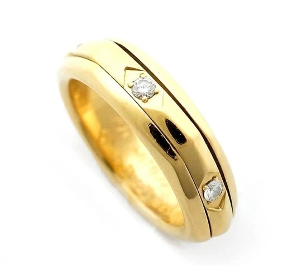 PIAGET POSSESSION DIAMOND 18K YELLOW GOLD RING: Piaget Possession Diamond 18k Yellow Gold Ring Brand: Piaget Type: Ring Material: 18k Yellow Gold Main Stone/Creation Natural Color: Yellow Size: 7.25 US Accessories: None Accessories Notice: