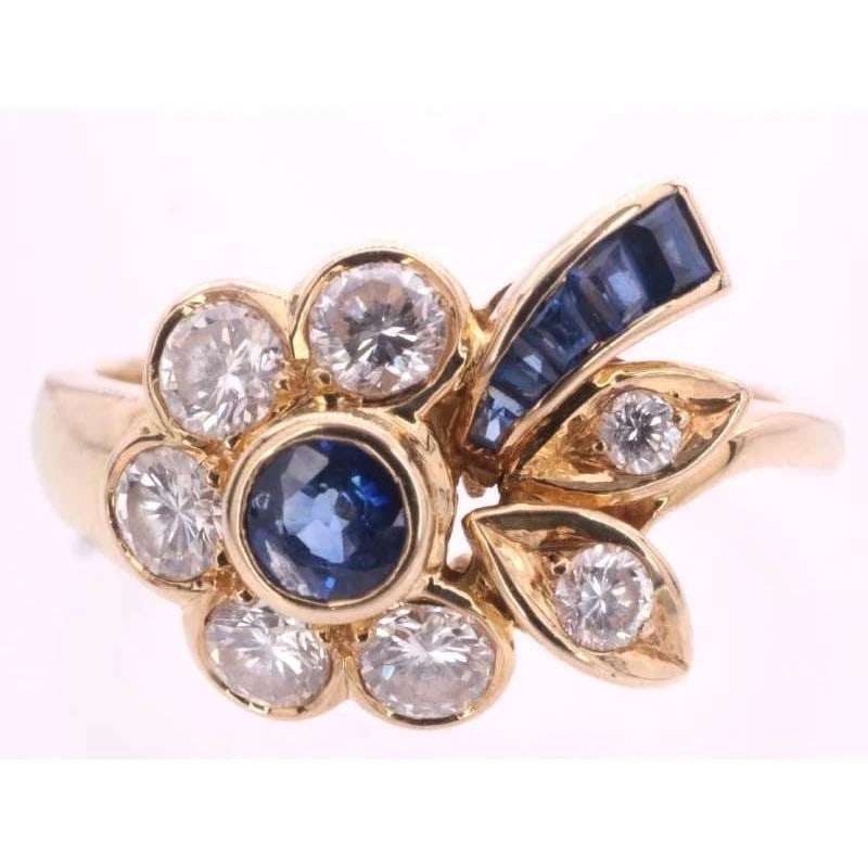 MOUAWAD SAPPHIRE DIAMOND FLOWER MOTIF 18K YELLOW GOLD COCKTAIL RING: Mouawad Sapphire Diamond Flower Motif 18k Yellow Gold Cocktail Ring Brand: Mouawad Type: Ring Material: 18k Yellow Gold Main Stone/Creation Natural Color: Yellow Size: 5 US Accessories: None <