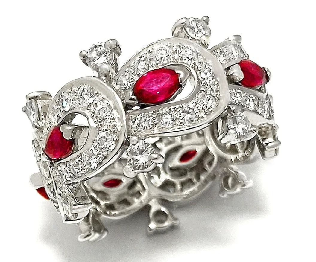 MOUAWAD RUBY MARQUISE 18K WHITE GOLD ETERNITY BAND RING: Mouawad Ruby Marquise 18k White Gold Eternity Band Ring Brand: Mouawad Type: Ring Material: 18k White Gold Main Stone/Creation Natural Color: White Size: 6.25 US Accessories: None Accessor