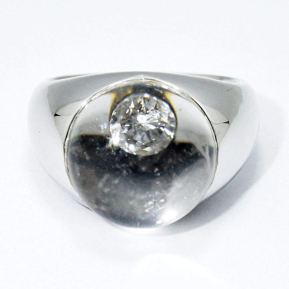 MAUBOUSSIN PARIS BOMBE ORB 18K WHITE GOLD QUARTZ RING: Mauboussin Paris Bombe Orb 18k White Gold Quartz Ring Brand: Mauboussin Type: Ring Material: 18k White Gold Main Stone/Creation QuartzSecondary Stone Natural Color: White Size: 10.5 US Accessorie
