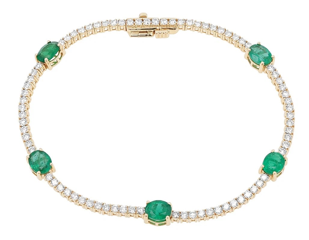 OVAL EMERALD ACCENTS DIAMOND TENNIS BRACELET: Oval Emerald Accents Diamond Tennis Bracelet Brand: None Type: Bracelet Material: 10k Yellow Gold Main Stone/Creation Natural Color: Yellow Gold Size: Dimension Length 7", Width 4.9 MM Accessorie