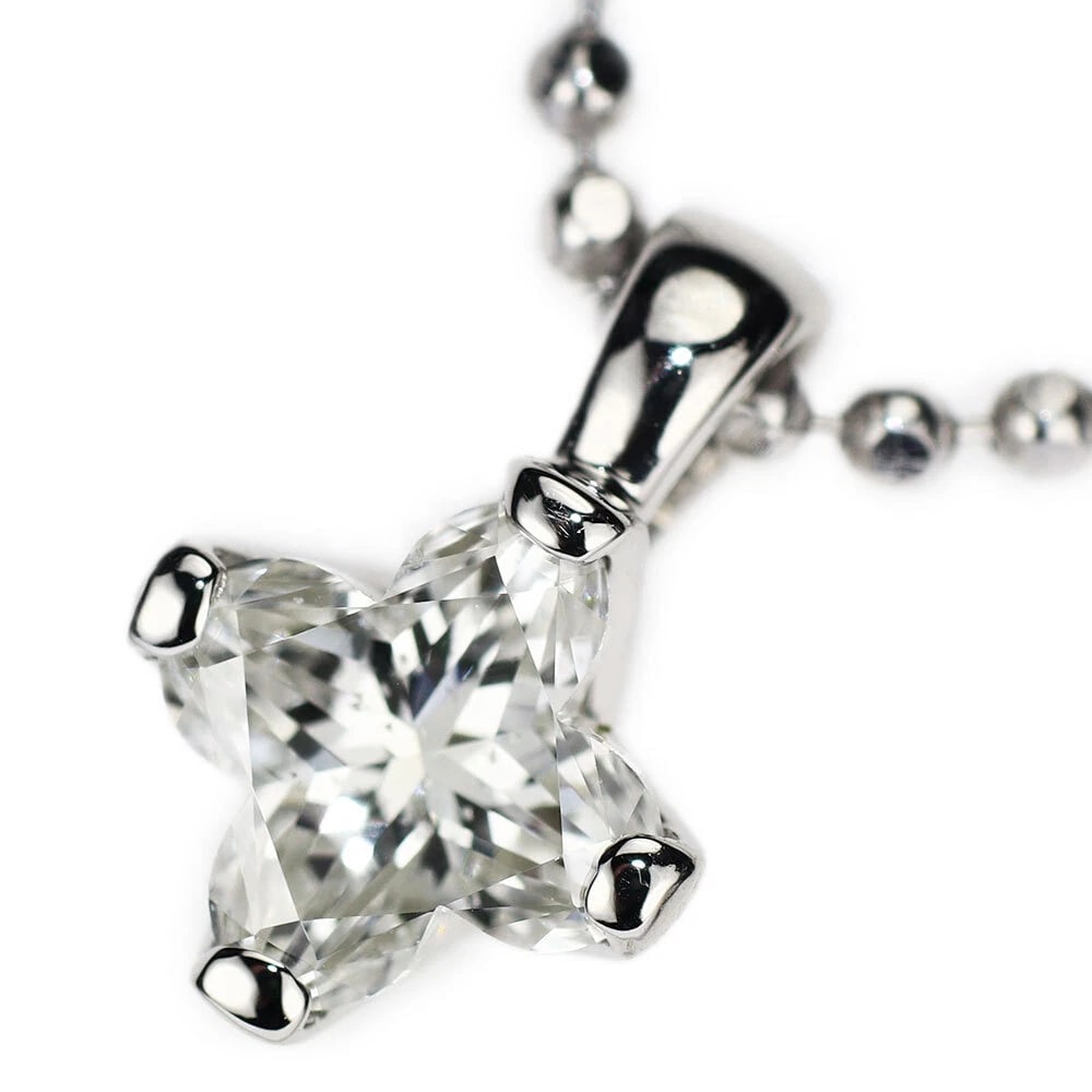 PT900/ PT850 LILY CUT DIAMOND PENDANT NECKLACE: Pt900/ Pt850 Lily Cut Diamond Pendant Necklace Brand: None Type: Pendant Necklace Material: Metal Purity None Metal Pt850 Main Stone/Creation Natural Color: None Size: Necklace: Chain Length