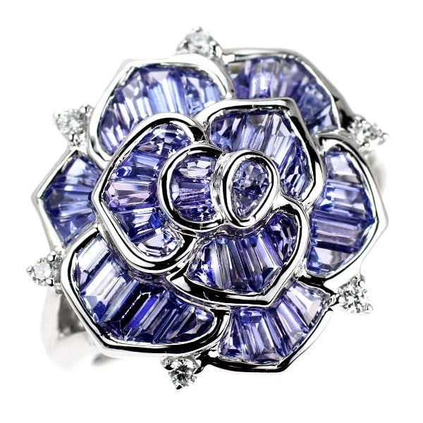 K18WG TANZANITE DIAMOND RING: K18WG Tanzanite Diamond Ring Brand: None Type: Ring Material: Metal Purity K18 Metal Gold Main Stone/Creation tanzanite Color: None Size: 7.5 US Accessories: None Accessories Notice: When