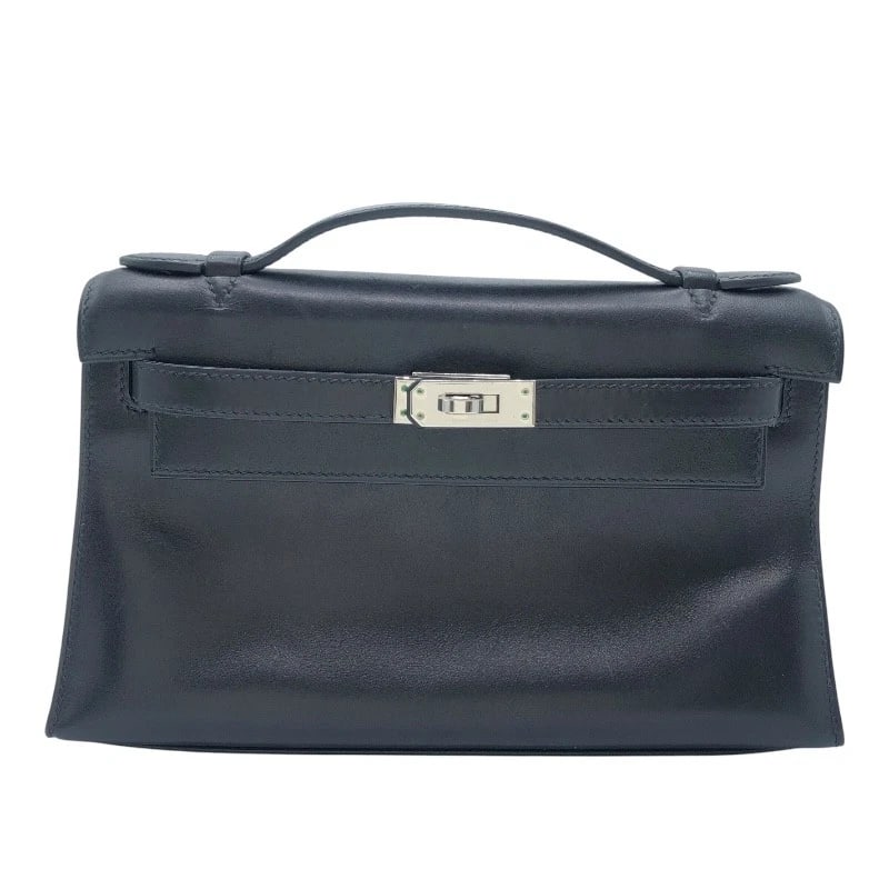 HERMES POCHETTE KELLY HANDBAG: HERMES Pochette Kelly Handbag Brand: HERMES Type: Handbag Material: Swift Color: Black SVHardware Size: W8.7 x H4.9x D2.4inch Accessories: None Accessories Notice: When purchasing pre-owned