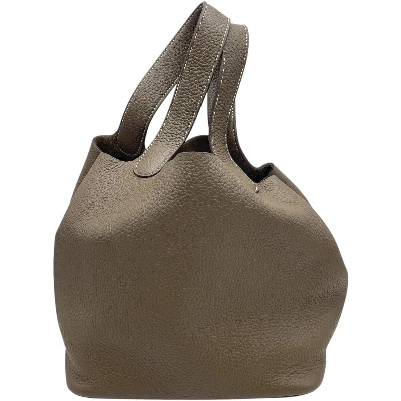 HERMES PICO TAN LOCK MM HANDBAG: HERMES Pico Tan Lock MM Handbag Brand: HERMES Type: Handbag Material: Taurillon Clemence Color: Etup GD Hardware Size: W8.7 x H0.0x D6.7inch Accessories: None Accessories Notice: When
