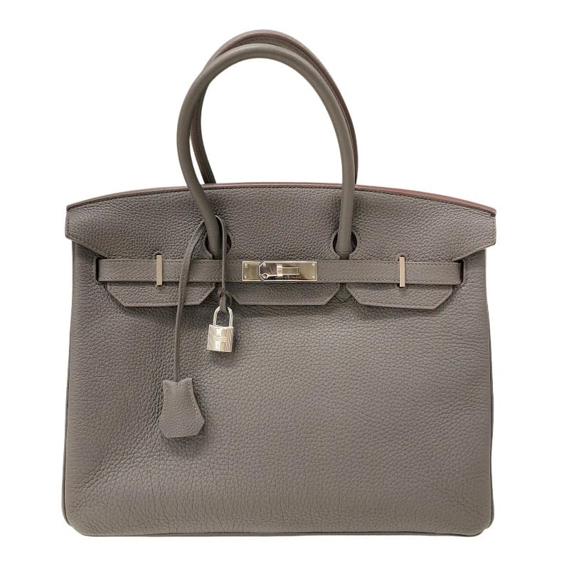 HERMES BIRKIN 35 HANDBAG: HERMES Birkin 35 Handbag Brand: HERMES Type: Handbag Material: Taurillon Clemence Color: Ethane SilverHardware Size: W13.8 x H9.8x D7.5inch Accessories: None Accessories Notice: When purch