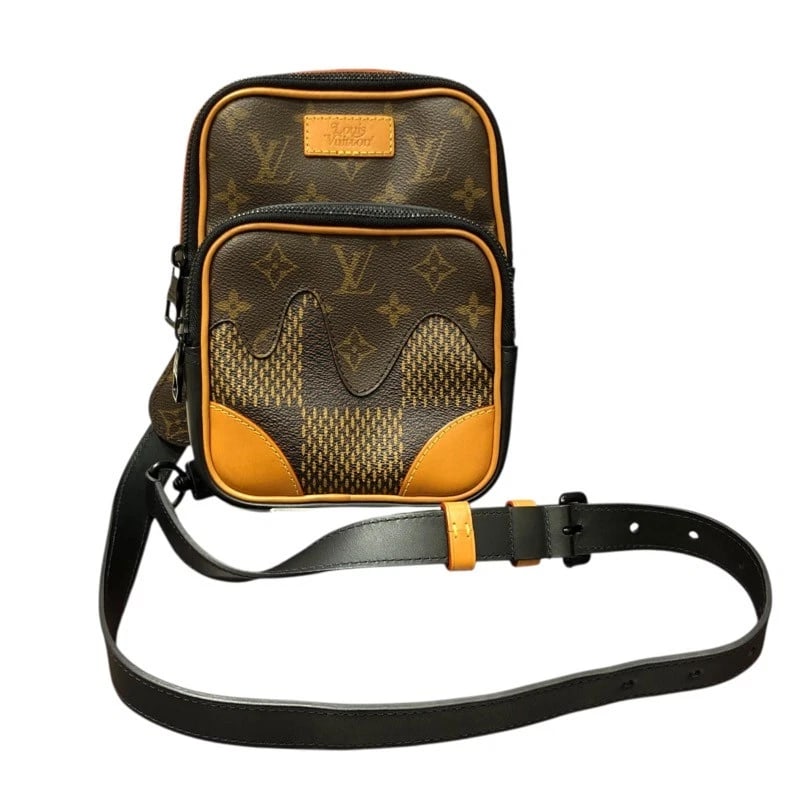 LOUIS VUITTON AMAZON SLING BAG NIGO SHOULDER BAG: LOUIS VUITTON Amazon Sling Bag NIGO Shoulder Bag Brand: LOUIS VUITTON Type: Shoulder Bag Material: Damier Giant Canvas Color: Damier Giant Size: W5.9 x H8.7x D1.8inch Shoulder:44.5inch 