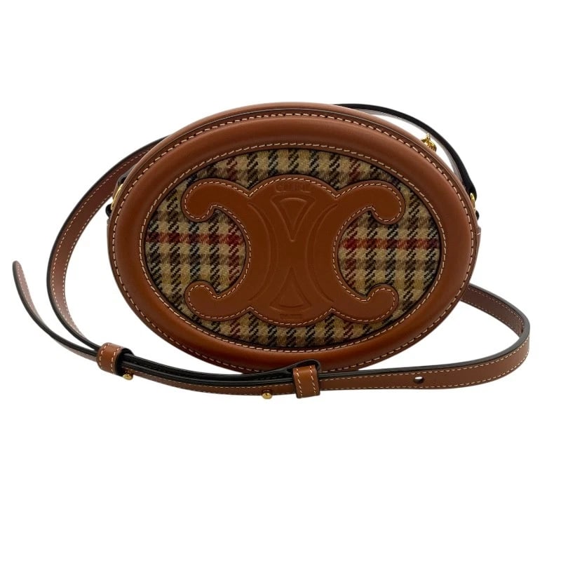 CELINE CROSSBODY CUIR TRIOMPHE OVAL PURSE SHOULDER BAG: CELINE Crossbody Cuir Triomphe Oval Purse Shoulder Bag Brand: CELINE Type: Shoulder Bag Material: Calfskin?Textiles Color: Tan Tartan Size: W6.5 x H4.9x D1.8inch Shoulder:48.4inch Accessories: No