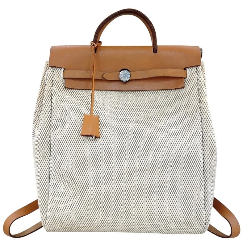 HERMES HERBAG AD PM BACKPACK Â· DAYPACK: HERMES Herbag ad PM Backpack Â· Daypack Brand: HERMES Type: Backpack Â· Daypack Material: Toile Leather Color: Beige Gold SVHardware Size: W11.4 x H13.8x D4.3inch Accessories: None