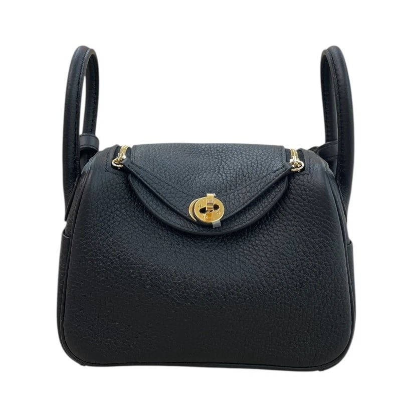 HERMES LINDY MINI SHOULDER BAG: HERMES Lindy mini Shoulder Bag Brand: HERMES Type: Shoulder Bag Material: Taurillon Clemence Color: Black Gold Hardware Size: W7.1 x H5.5x D3.9inch Shoulder:34.3inch Accessories: None