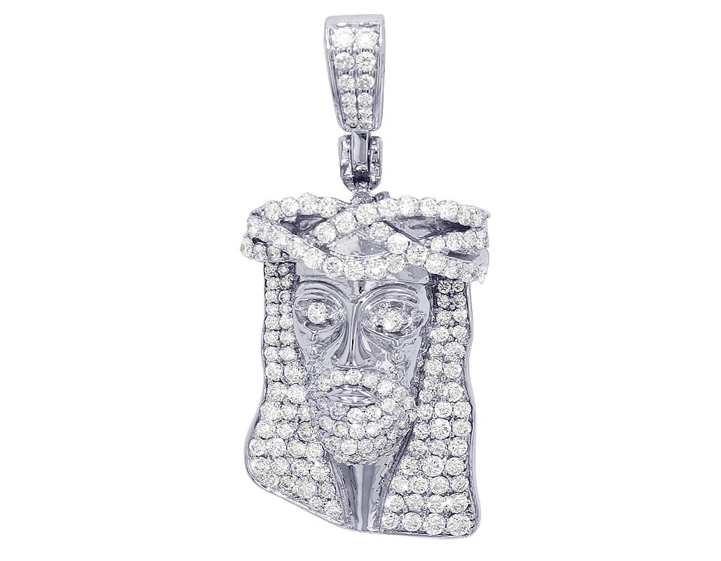 REAL JESUS FACE DIAMOND PENDANT: Real Jesus Face Diamond Pendant Brand: None Type: Pendant Material: 14k White Gold Main Stone/Creation Natural Color: White Gold Size: Dimension 1.8" x 0.5" x 9mm Accessories: None Accesso