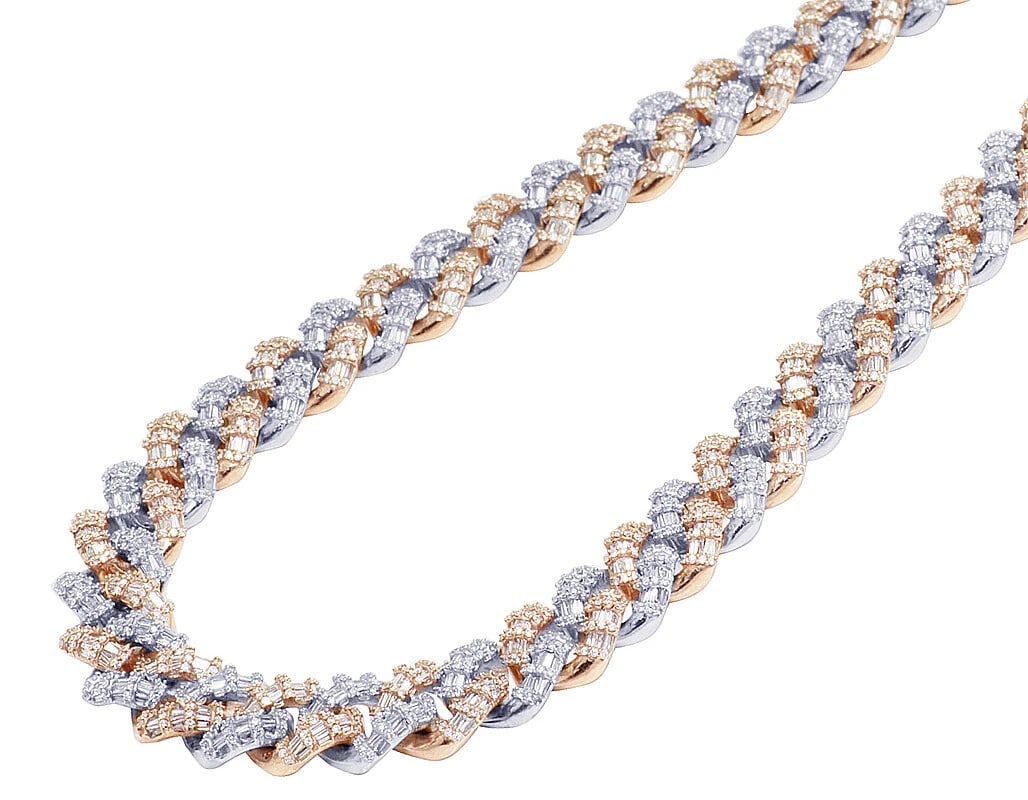 10K TWO-TONE WHITE/ROSE GOLD REAL DIAMOND BAGUETTE CUBAN CHAIN: 10K Two-Tone White/Rose Gold Real Diamond Baguette Cuban Chain Brand: None Type: Necklace Material: 10k Multi-Tone Gold Main Stone/Creation Natural Color: Multi-Tone Size: Length18" Width 12 MM A