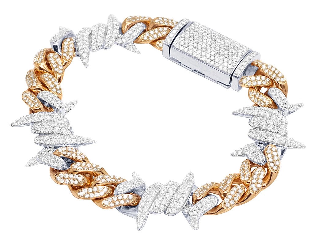 ROSE / WHITE GOLD THORN CUBAN REAL DIAMOND BRACELET: Rose / White Gold Thorn Cuban Real Diamond Bracelet Brand: Jewelry Hiphop Type: Necklace Material: 10k Rose Gold Main Stone/Creation Natural Color: Rose Gold Size: Dimension 8" 11mm Accessories: