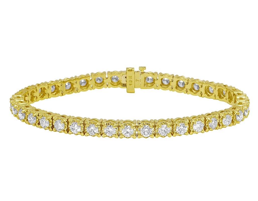 YELLOW GOLD TENNIS GENUINE DIAMOND SET BRACELET: Yellow Gold Tennis Genuine Diamond Set Bracelet Brand: None Type: Bracelet Material: 10k Yellow Gold Main Stone/Creation Natural Color: Yellow Gold Size: Length 8 in Width 6MM Accessories: None