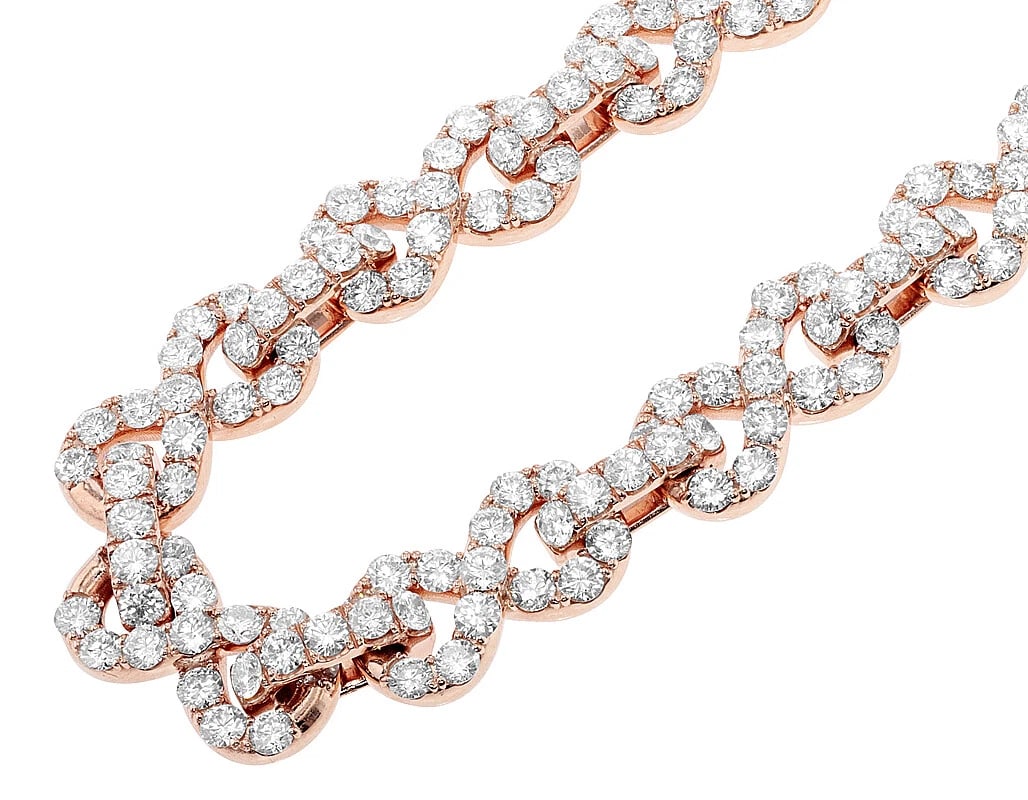 15 POINTER SOLITAIRE REAL DIAMOND INFINITY NECKLACE: 15 Pointer Solitaire Real Diamond Infinity Necklace Brand: None Type: Necklace Material: 10k Rose Gold Main Stone/Creation Natural Color: Rose Gold Size: Length 22" Width 11.0mm Accessories: None