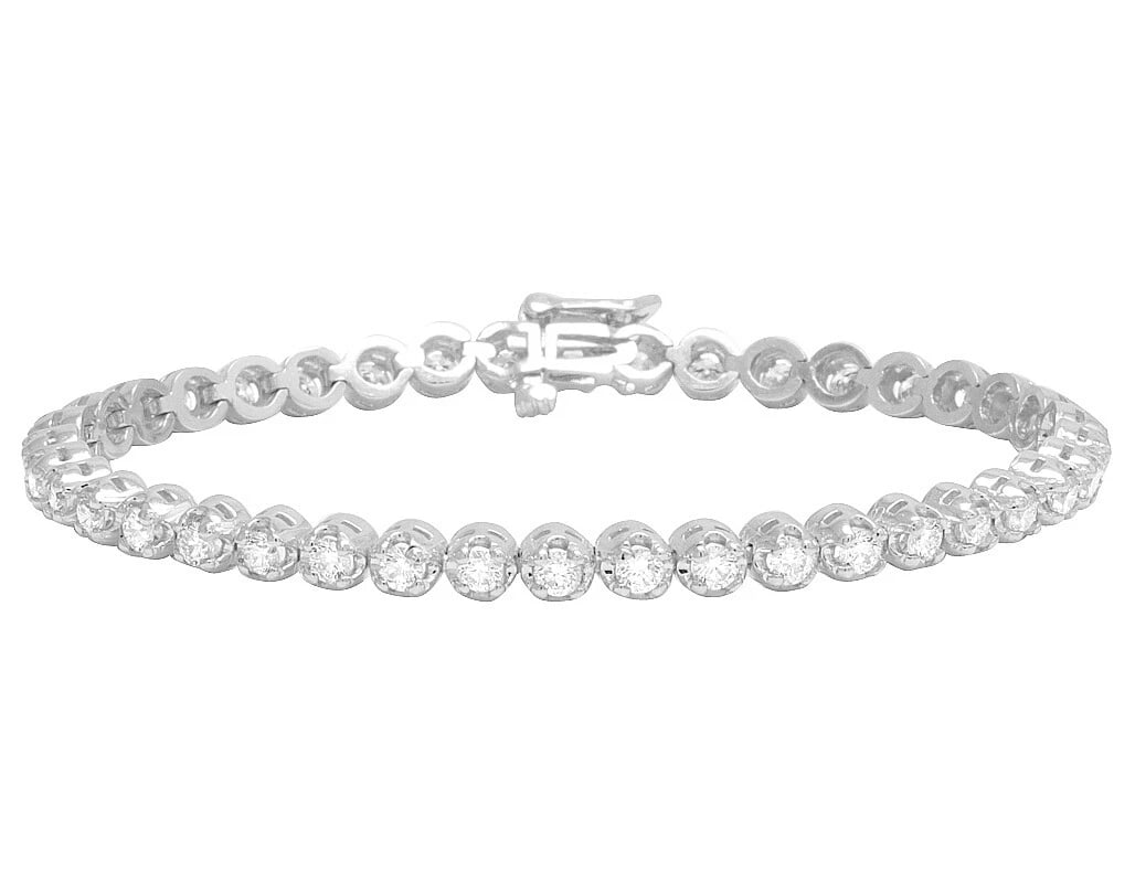 LADIES 1 ROW TENNIS REAL DIAMOND BRACELET 10K WHITE GOLD: Ladies 1 Row Tennis Real Diamond Bracelet 10K White Gold Brand: None Type: Bracelet Material: 10k White Gold Main Stone/Creation Natural Color: White Gold Size: Dimension 5mm, 7 inches Accessorie