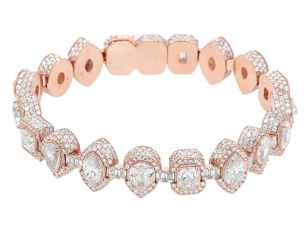 PEAR-MARQUISE-EMERALD REAL DIAMOND BRACELET 10K ROSE GOLD: Pear-Marquise-Emerald Real Diamond Bracelet 10K Rose Gold Brand: None Type: Bracelet Material: 10k Rose Gold Main Stone/Creation Natural Color: Rose Gold Size: Dimension L 8.25" , W 13.5mm Access