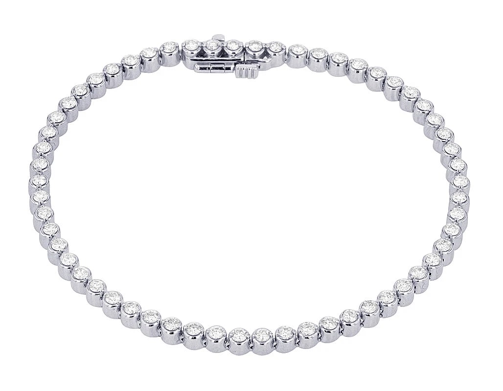 BEZEL SET REAL DIAMOND TENNIS BRACELET: Bezel Set Real Diamond Tennis Bracelet Brand: None Type: Bracelet Material: 14k White Gold Main Stone/Creation Natural Color: White Gold Size: Dimension W 3mm, L 7" Accessories: None Acces