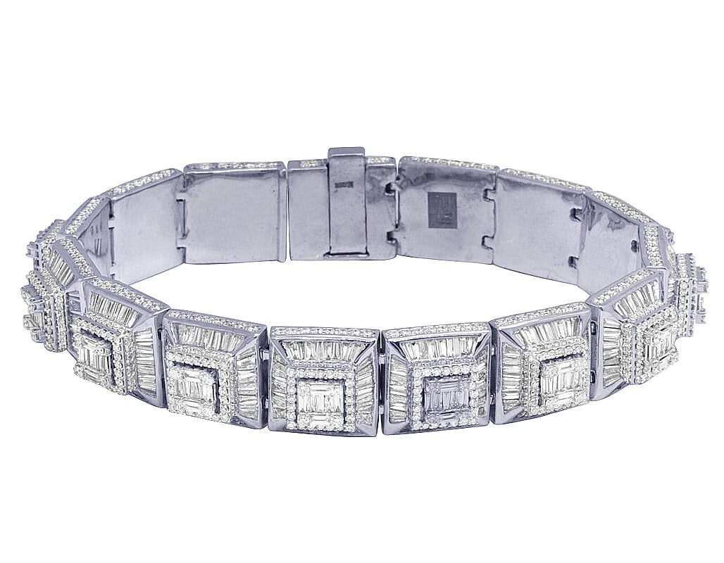 WHITE GOLD PYRAMID STYLE BAGUETTE REAL DIAMOND 2 TIER BRACELET: White Gold Pyramid Style Baguette Real Diamond 2 Tier Bracelet Brand: None Type: Bracelet Material: 10k White Gold Color: White Gold Size: Dimension(s) 19MM wide 8.25" length Accessories: