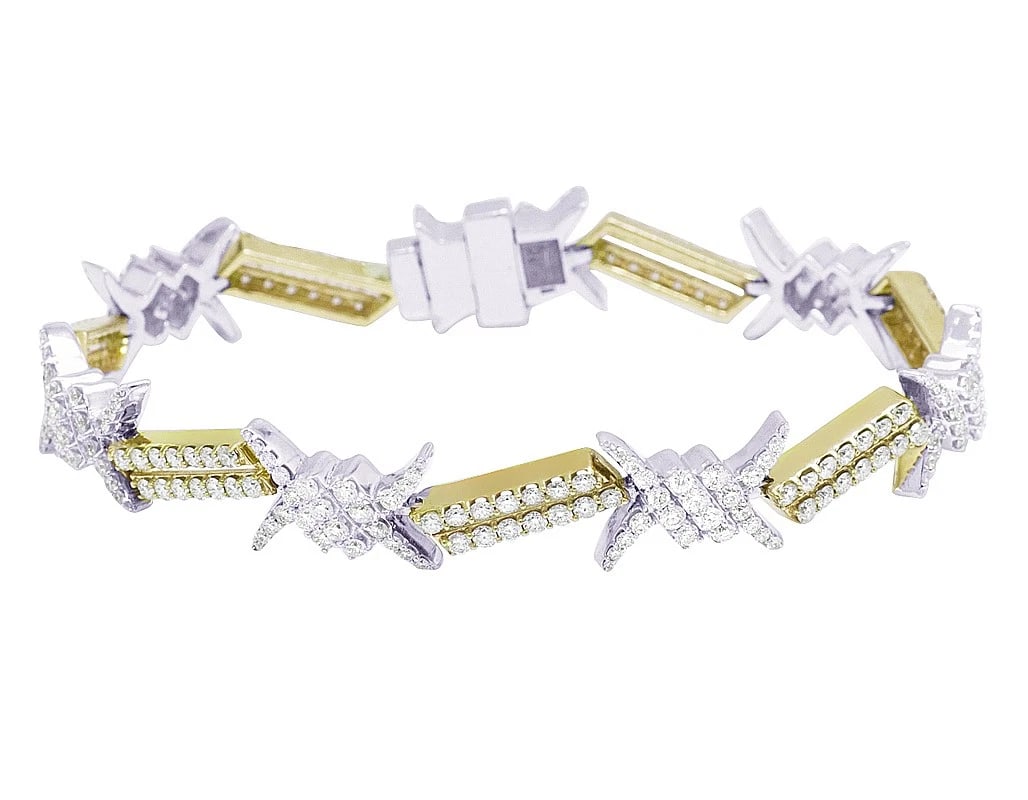 10K TWO-TONE YELLOW/WHITE GOLD BARBED REAL DIAMOND BRACELET: 10k Two-Tone Yellow/White Gold Barbed Real Diamond Bracelet Brand: Jewelry Hiphop Type: Bracelet Material: 10k Multi-Tone Gold Main Stone/Creation Natural Color: Multi-Tone Size: Dimension