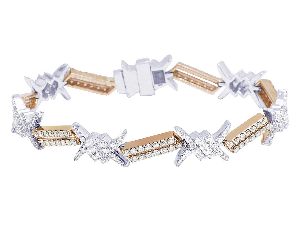 10K TWO-TONE YELLOW/WHITE GOLD BARBED DIAMOND BRACELET: 10k Two-Tone Yellow/White Gold Barbed Diamond Bracelet Brand: Jewelry Hiphop Type: Necklace Material: 10k Rose Gold Main Stone/Creation Natural Color: Rose Gold Size: Dimension 8.25" 12.5mm Acces