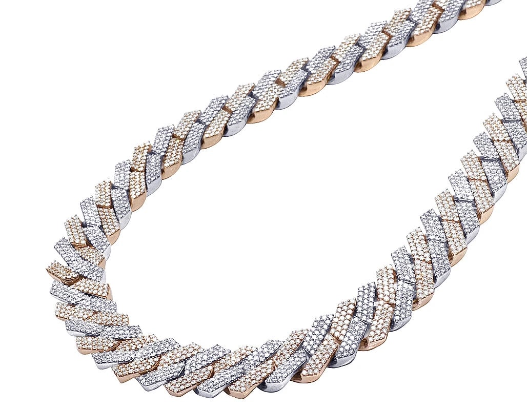 10K TWO-TONE ROSE/WHITE GOLD REAL DIAMOND CUBAN CHAIN: 10K Two-Tone Rose/White Gold Real Diamond Cuban Chain Brand: None Type: Necklace Material: 10k,Multi-Tone Gold Main Stone/Creation Natural Color: Multi-Tone Size: Length 21" Width 16MM Accessorie