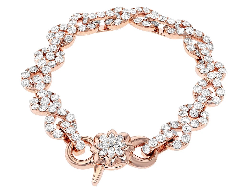 INFINITY 15 POINTER SOLITAIRE REAL DIAMOND LINK BRACELET: Infinity 15 Pointer Solitaire Real Diamond Link Bracelet Brand: None Type: Bracelet Material: 10k Rose Gold Main Stone/Creation Natural Color: Main Stone Color White Size: Dimension L 8" , W 11mm