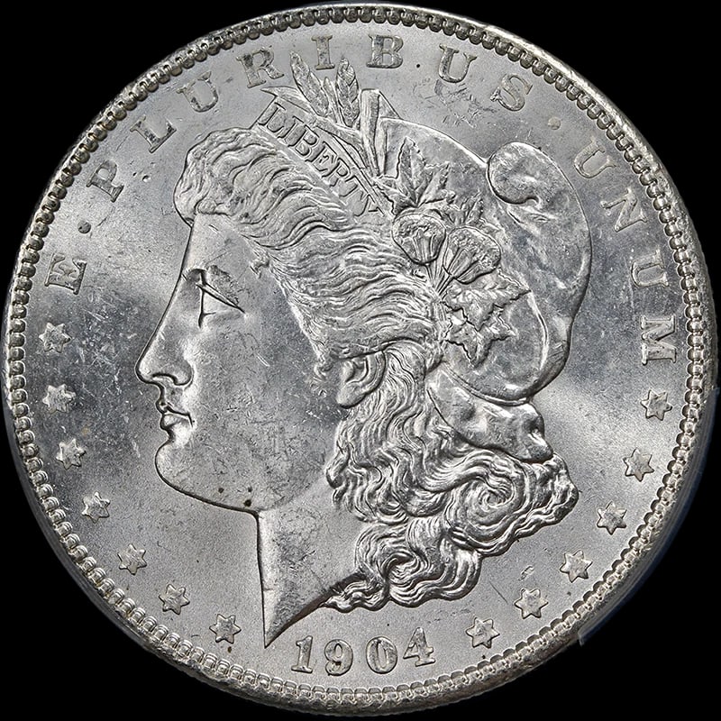 1904-P MORGAN SILVER DOLLAR: 1904-P Morgan Silver Dollar Year: 1904 Fineness: 0.9 Composition: Silver Denomination: None Country of Origin: United States Accessories: None Accessories Notice: When purchasing pre-owned