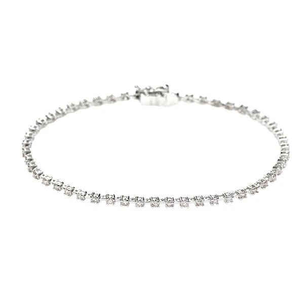 K18WG TENNIS DIAMOND BRACELET: K18WG TENNIS DIAMOND BRACELET Brand: None Type: bracelets Material: Metal Purity K18 Metal Gold Main Stone/Creation Natural Color: White Gold Size: Chain Length 18.5 Length/Width/Diameter 2.1 