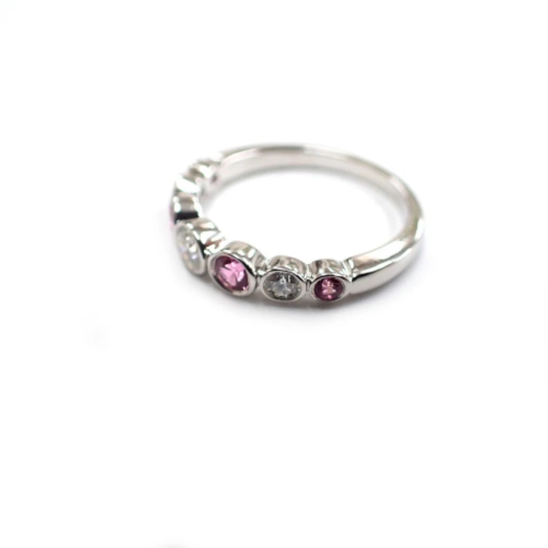TIFFANY & CO JAZZ PINK SAPPHIRE DIAMONDPT950 BAND RING: Tiffany & Co Jazz Pink Sapphire DiamondPT950 Band Ring Brand: Tiffany & Co. Type: Ring Material: Platinum 950 Main Stone/Creation Natural Color: White Size: 5 US Accessories: None Accessories