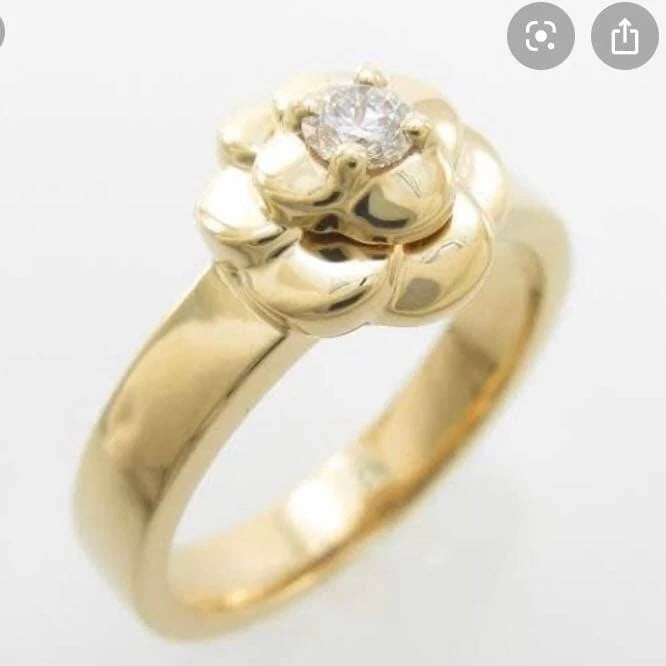 CHANEL CAMELLIA YELLOW GOLD DIAMOND RING: CHANEL Camellia Yellow Gold Diamond Ring Brand: CHANEL Type: Ring Material: 18k Yellow Gold Main Stone/Creation Natural Color: Yellow Gold Size: 3.5-4 US Accessories: None Accessories Notice: