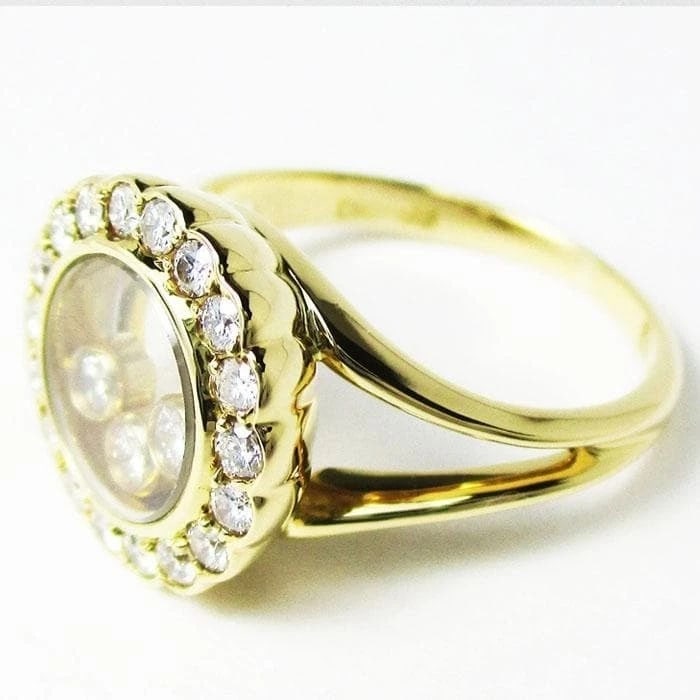 CHOPARD HAPPY DIAMONDS ROUND RING: Chopard Happy Diamonds Round Ring Brand: Chopard Type: Ring Material: 18k Yellow Gold Main Stone/Creation Natural Color: Yellow Size: 5 US Accessories: None Accessories Notice: When purcha