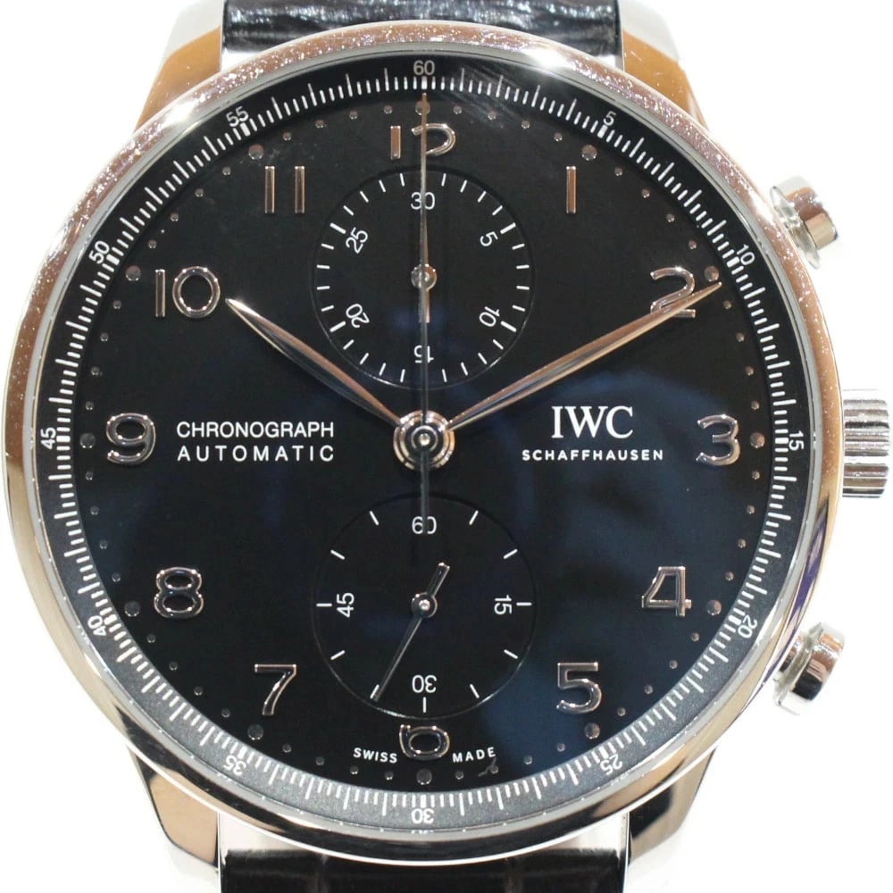 IWC PORTUGUESE CHRONOGRAPH BLACK WATCH: IWC Portuguese Chronograph Black Watch Brand: IWC Type: Wristwatch Material: Band MaterialStainless Steel, Band MaterialStainless Steel, Case MaterialCase MaterialN/A Color: black Size: Wrist