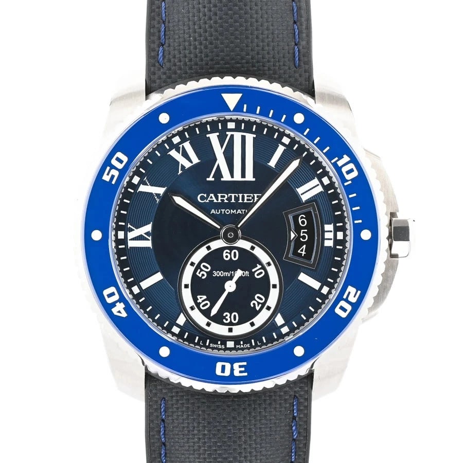 CARTIER CALIBRE BLUE WATCH: CARTIER Calibre Blue Watch Brand: CARTIER Type: Wristwatch Material: Band MaterialStainless Steel/Leather Strap, Band MaterialStainless Steel/Leather Strap, Case MaterialCase MaterialN/A Color: