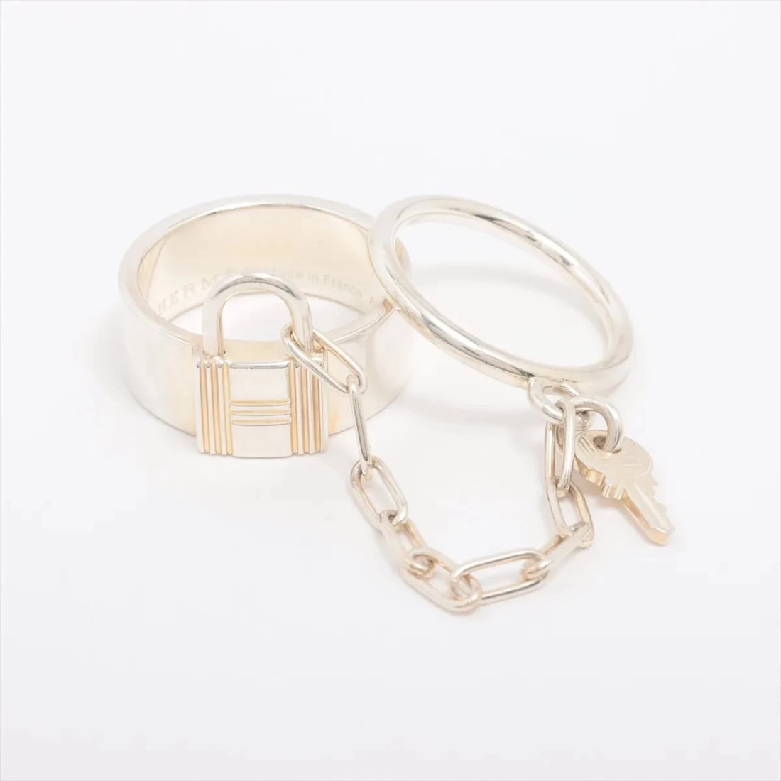 HERMES ALPHA KELLY DOUBLE RING: Hermes Alpha Kelly double Ring Brand: Hermes Type/Style: Ring Material: 925, Color: Silver Size: 7.25 US Accessories: None Accessories Notice: When purchasing pre-owned goods, please refer to