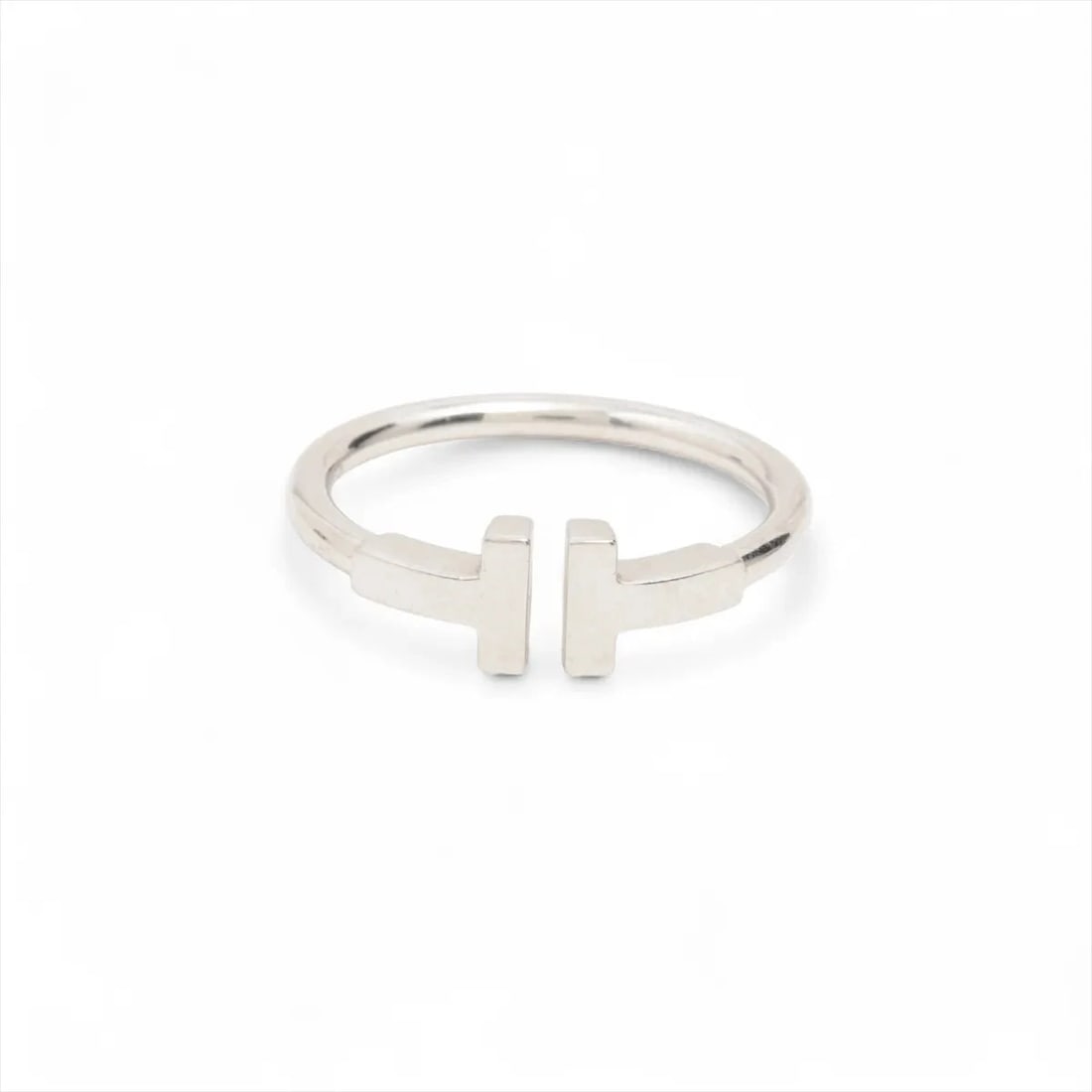 TIFFANY T WIRE RING 750(WG): Tiffany T Wire Ring 750(WG) Brand: Tiffany Type/Style: Ring Material: 750(WG), Color: WG Size: 6 US Accessories: None Accessories Notice: When purchasing pre-owned goods, please refer to the