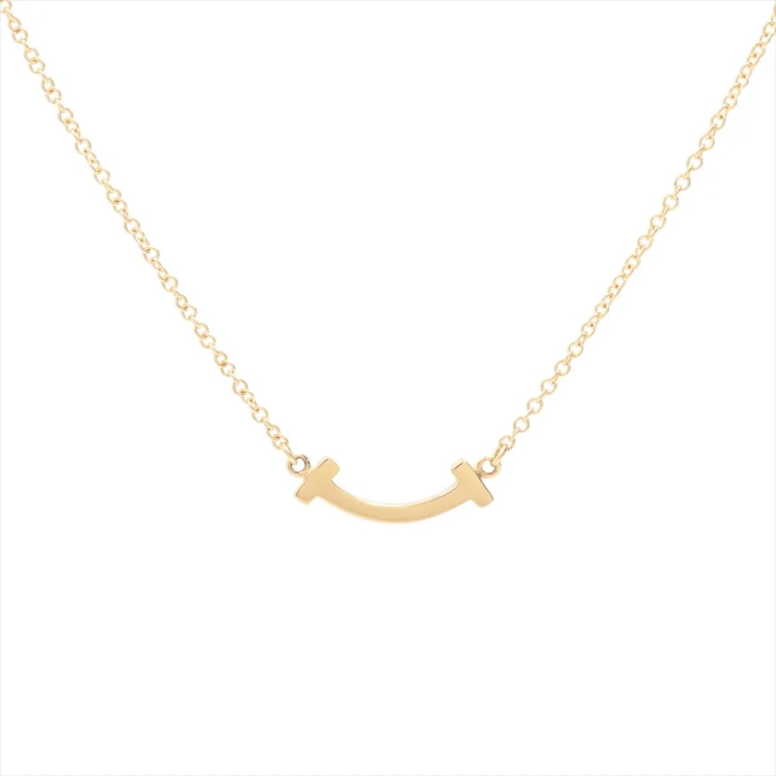TIFFANY T SMILE MINI NECKLACE 750(YG): Tiffany T Smile Mini Necklace 750(YG) Brand: Tiffany Type/Style: Necklace Material: 750(YG), Color: YG Size: Size(CM) Chain length:46 Accessories: None Accessories Notice: When purchasing