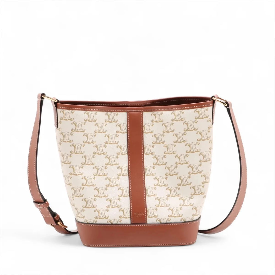 CELINE TRIOMPHE SMALL BUCKET PVCX LEATHER SHOULDER BAG: Celine Triomphe SMALL BUCKET PVCx leather Shoulder bag Brand: Celine Type: Shoulder bag Material: PVC Color: Beige Size: Height:8.7inch Length:7.1inch Depth:5.1inch Shoulder height:21.9inch 