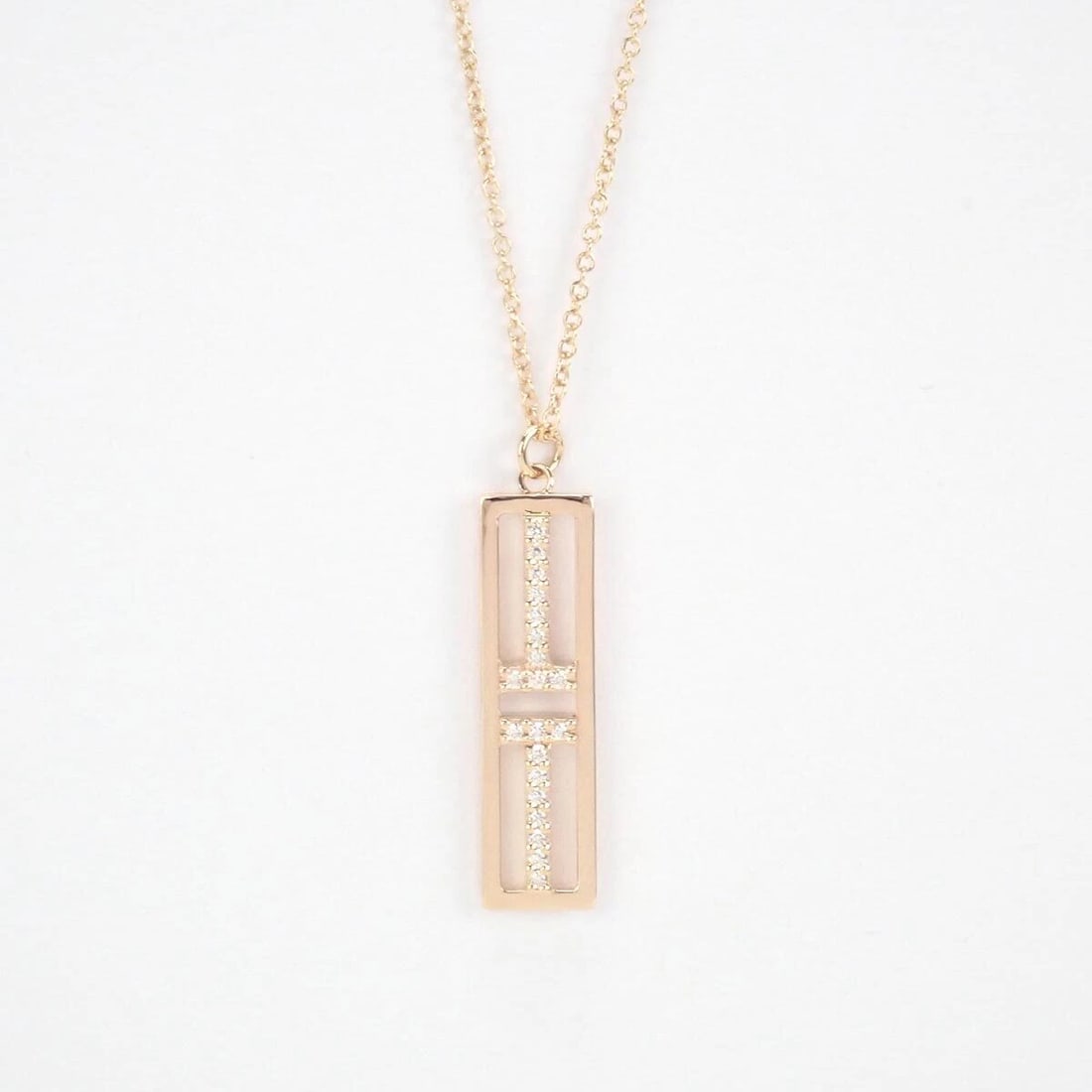 TIFFANY & CO. T TWO OPEN VERTICAL BAR 18K ROSE GOLD: Tiffany & Co. T Two Open Vertical Bar 18K Rose Gold Brand: Tiffany & Co. Type/Style: Necklace Material: 18KRG, Main Stone/Creation natural Color: Gold Size: Pendant Length0.25x0.93 inch /