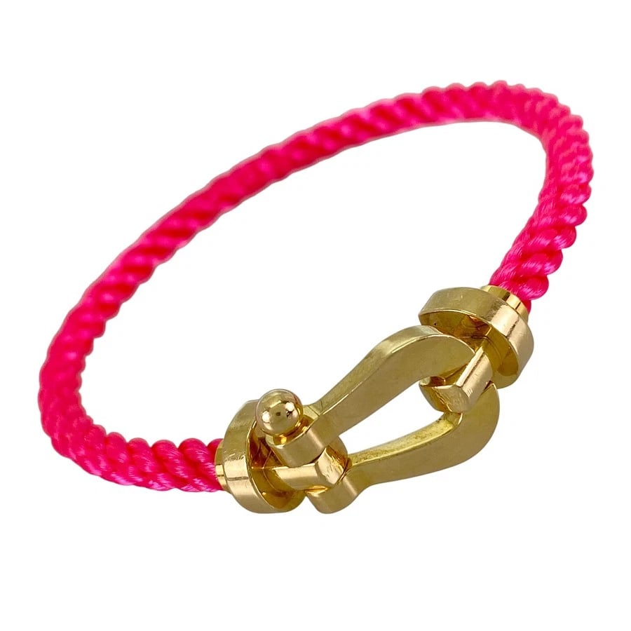 FRED FORCE 10 LM YELLOW GOLD BRACELET: FRED Force 10 LM Yellow gold Bracelet Brand: FRED Type/Style: Bracelet Material: 18K Yellow Gold Stainless Steel, Color: Gold Pink Size: Top size:26.0mm×12.8mm Wrist Size:18.0cm Accessories:
