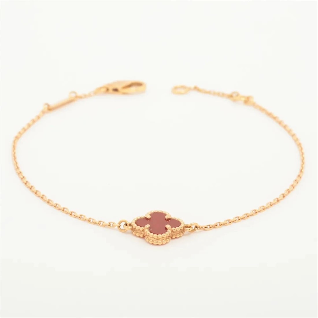 VAN CLEEF & ARPELS SWEET ALHAMBRA CARNELIAN BRACELET 750(PG): Van Cleef & Arpels Sweet Alhambra Carnelian Bracelet 750(PG) Brand: Van Cleef & Arpels Type: Bracelet Material: 750(PG) Color: Pink Gold Size: Bracelet length:17.6 Accessories: None
