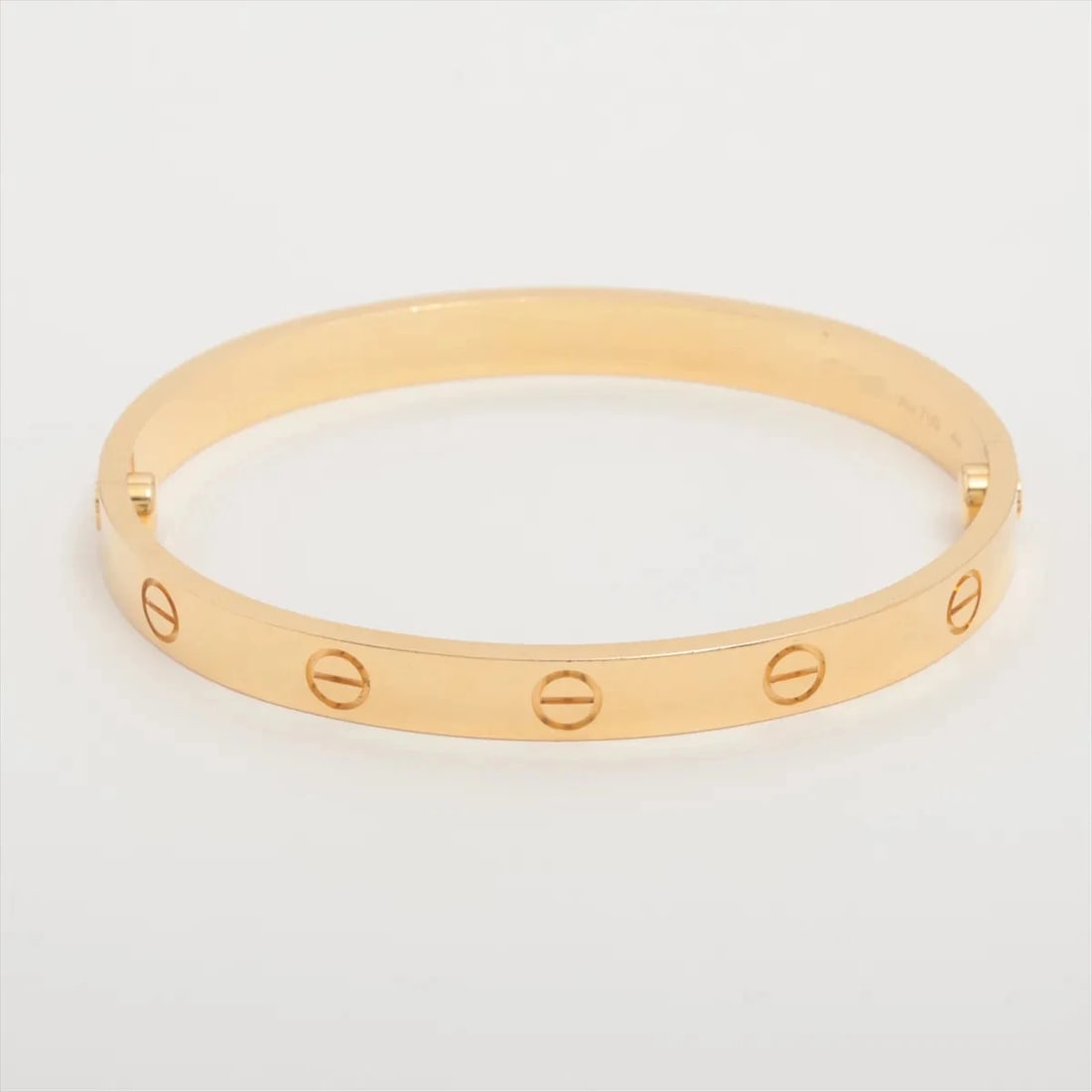 CARTIER LOVE BRACELET 750(YG): Cartier Love Bracelet 750(YG) Brand: Cartier Type: Bracelet Material: 750(YG) Color: Yellow Gold Size: Bracelet length:16.2 Accessories: None Accessories Notice: When purchasing pre-owned