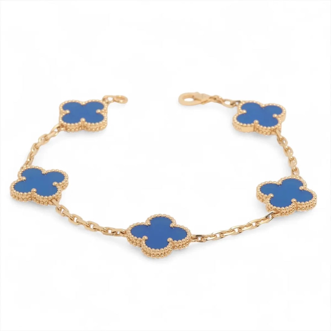 VAN CLEEF & ARPELS VINTAGE ALHAMBRA BLUE AGATE BRACELET 750(YG): Van Cleef & Arpels Vintage Alhambra Blue Agate Bracelet 750(YG) Brand: Van Cleef & Arpels Type: Bracelet Material: 750(YG) Color: Yellow Gold Size: Bracelet length:19 Accessories: None Acc