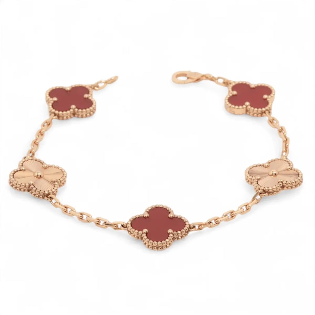 VAN CLEEF & ARPELS VINTAGE ALHAMBRA GUILLOCHE 5P CARNELIAN BRACELET: Van Cleef & Arpels Vintage Alhambra Guilloche 5P Carnelian Bracelet Brand: Van Cleef & Arpels Type: Bracelet Material: 750(PG) Color: Pink Gold Size: Bracelet length:19.4 Accessories: None