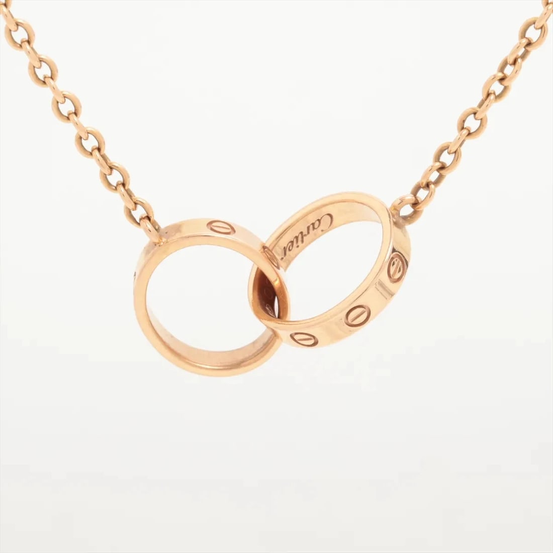 CARTIER BABY LOVE NECKLACE 750(PG): Cartier Baby Love Necklace 750(PG) Brand: Cartier Type: Necklace Material: 750(PG) Color: Pink Gold Size: Chain length:46.3 Accessories: None Accessories Notice: When purchasing pre-owned