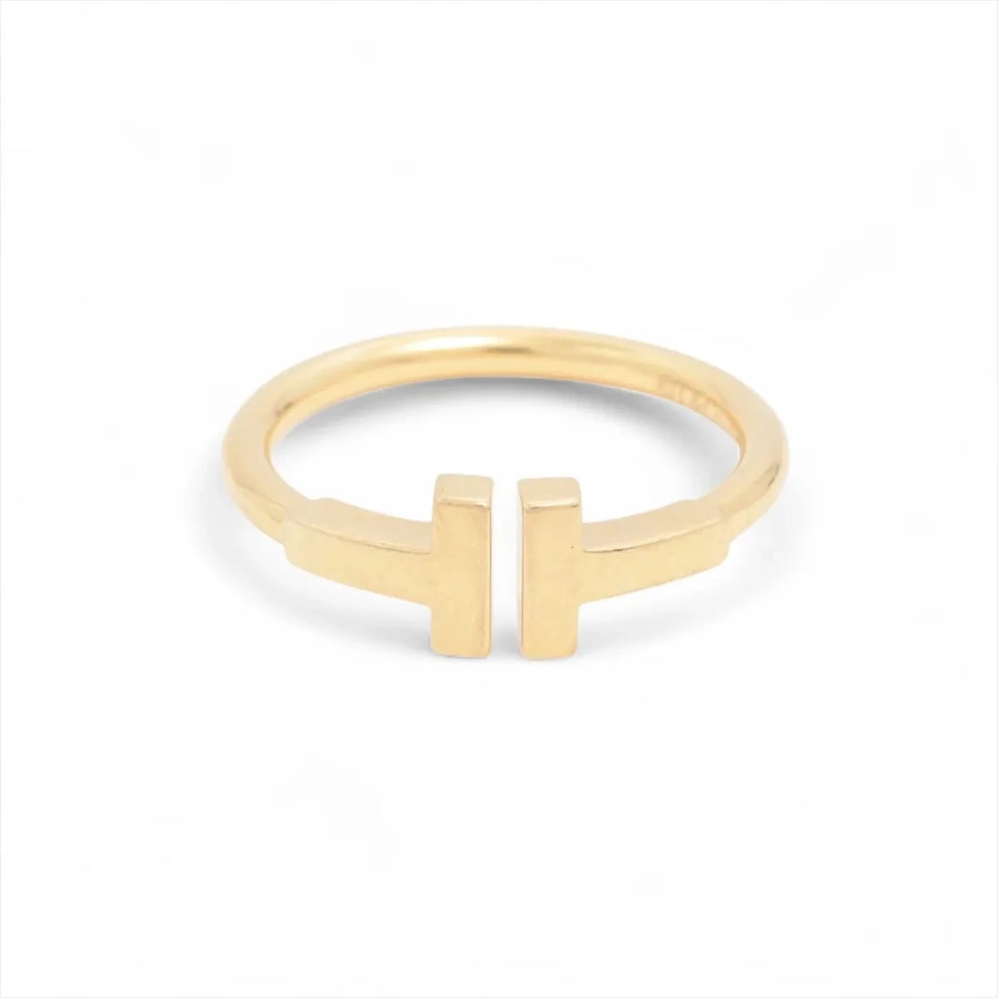 TIFFANY T WIRE RING 750(YG): Tiffany T Wire Ring 750(YG) Brand: Tiffany Type: Ring Material: 750(YG) Color: Yellow Gold Size: 4.75 - 5 US Accessories: None Accessories Notice: When purchasing pre-owned goods, please