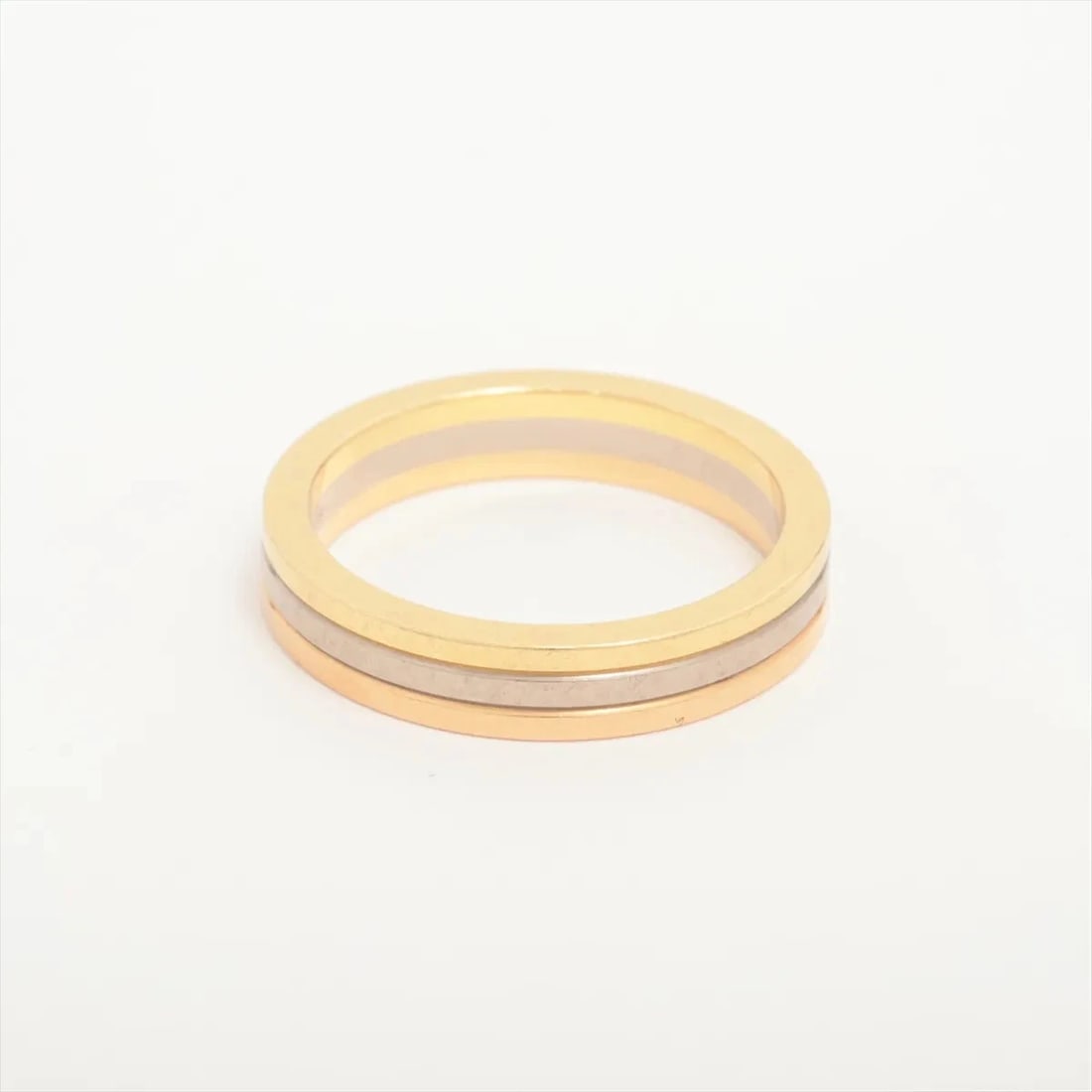 CARTIER TRICOLOR RING 750(YG×PG×WG): Cartier Tricolor Ring 750(YG×PG×WG) Brand: Cartier Type: Ring Material: 750(YG×PG×WG) Color: YG×PG×WG Size: 4.5 US Accessories: None Accessories Notice: When purchasing pre-owned goods,